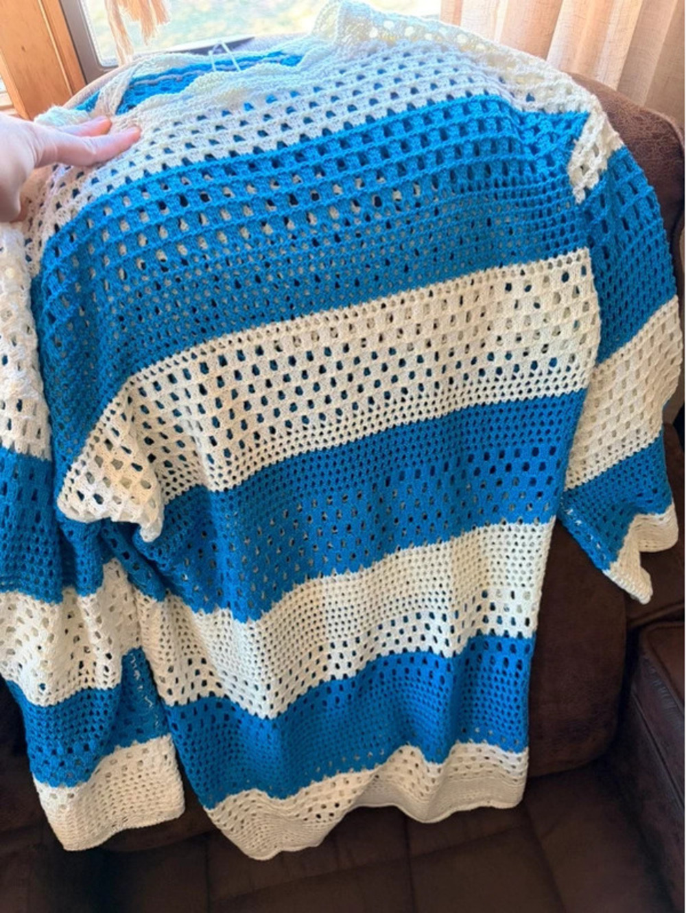 Crocheted blue and white swimsuit cover up